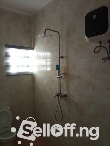 A wing of semi detached house of 2 bedroom at kolapo ishola GRA available for rent.