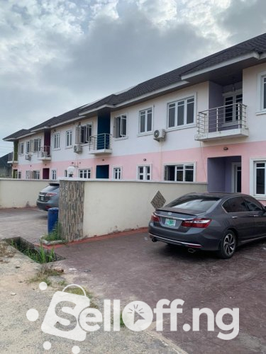 A modern 4bedroom duplex at Oluyole estate with a room with BQ room selfcon