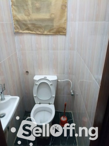 Four bedrooms bungalow all rooms ensuites with C of O Commodore area, Elebu, Ibadan for sale.