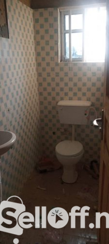 A room and parlour self contain in a gated and interlock compound at oaks street, Alalubosa GRA