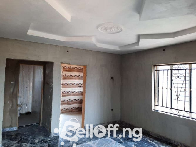 Newly built room and parlour self contain at sharp corner oluyole.