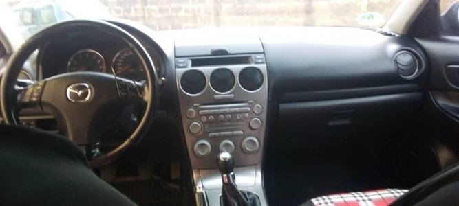Very neat Mazda at giveaway price 17