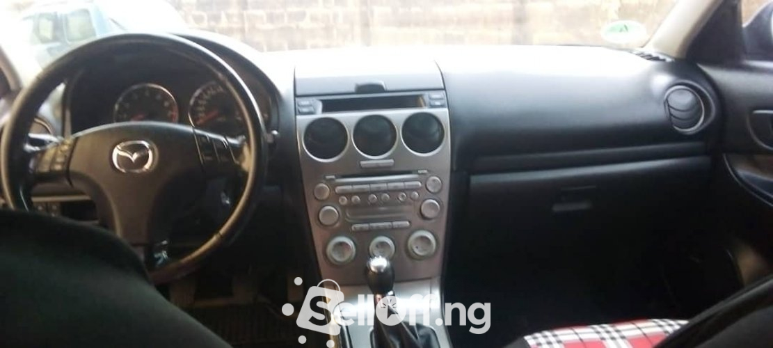 Very neat Mazda at giveaway price