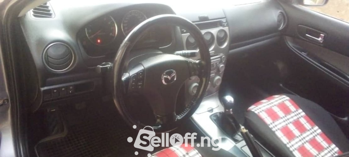 Very neat Mazda at giveaway price