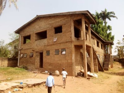 Uncompleted Two units of 2 bedroom flats upstairs and 8 rooms downstairs on a full plot of land.