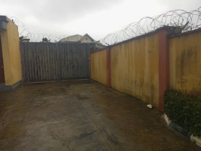 A room and Parlor self contain, terazo, water running, well fenced and gated 9