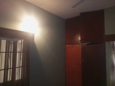 A room and Parlor self contain, terazo, water running, well fenced and gated 7