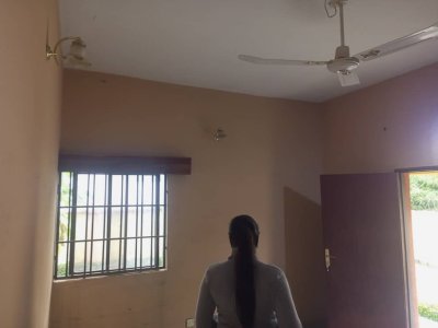 A room and Parlor self contain, terazo, water running, well fenced and gated 6