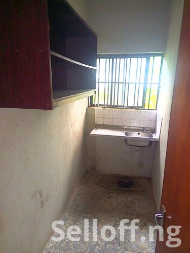 A room and Parlor self contain, terazo, water running, well fenced and gated