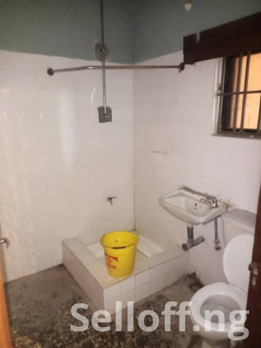 A room and Parlor self contain, terazo, water running, well fenced and gated