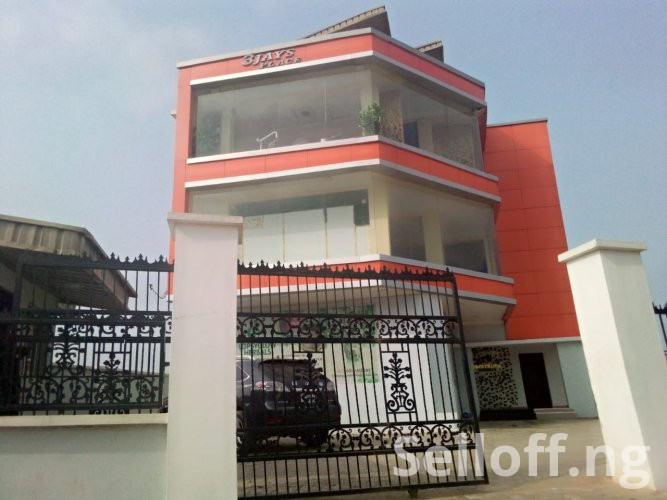 FOR SALE: A storey building (complex) with 3 floors