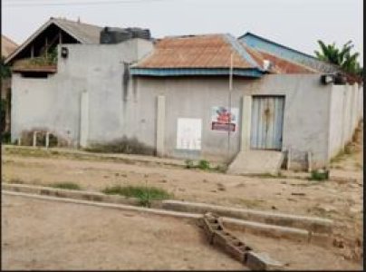 For Sale: A standard 3-bedroom flat on a full plot of land