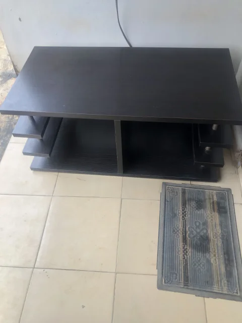 Neat black wooden center table