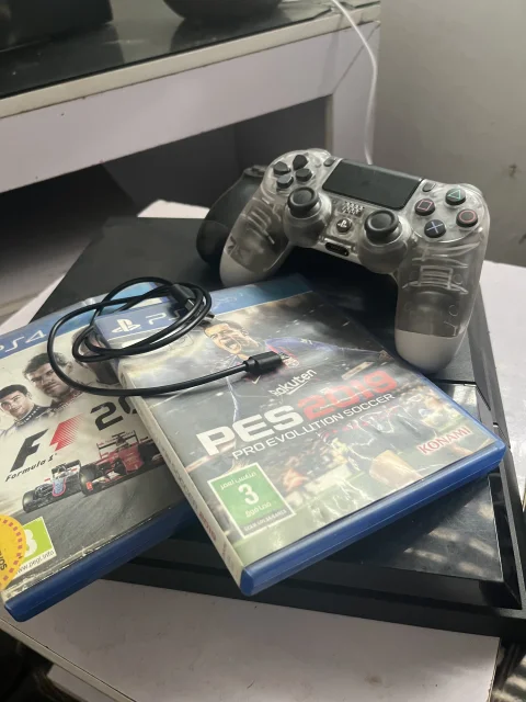 PlayStation 4 Fat 500GB (PS4)  with 2 Controllers + 2 Free Games 5