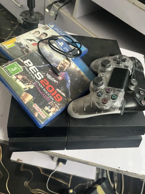 PlayStation 4 Fat 500GB (PS4)  with 2 Controllers + 2 Free Games 3