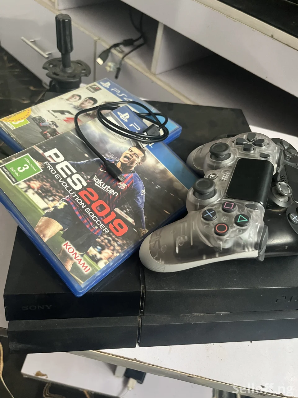 PlayStation 4 Fat 500GB (PS4)  with 2 Controllers + 2 Free Games