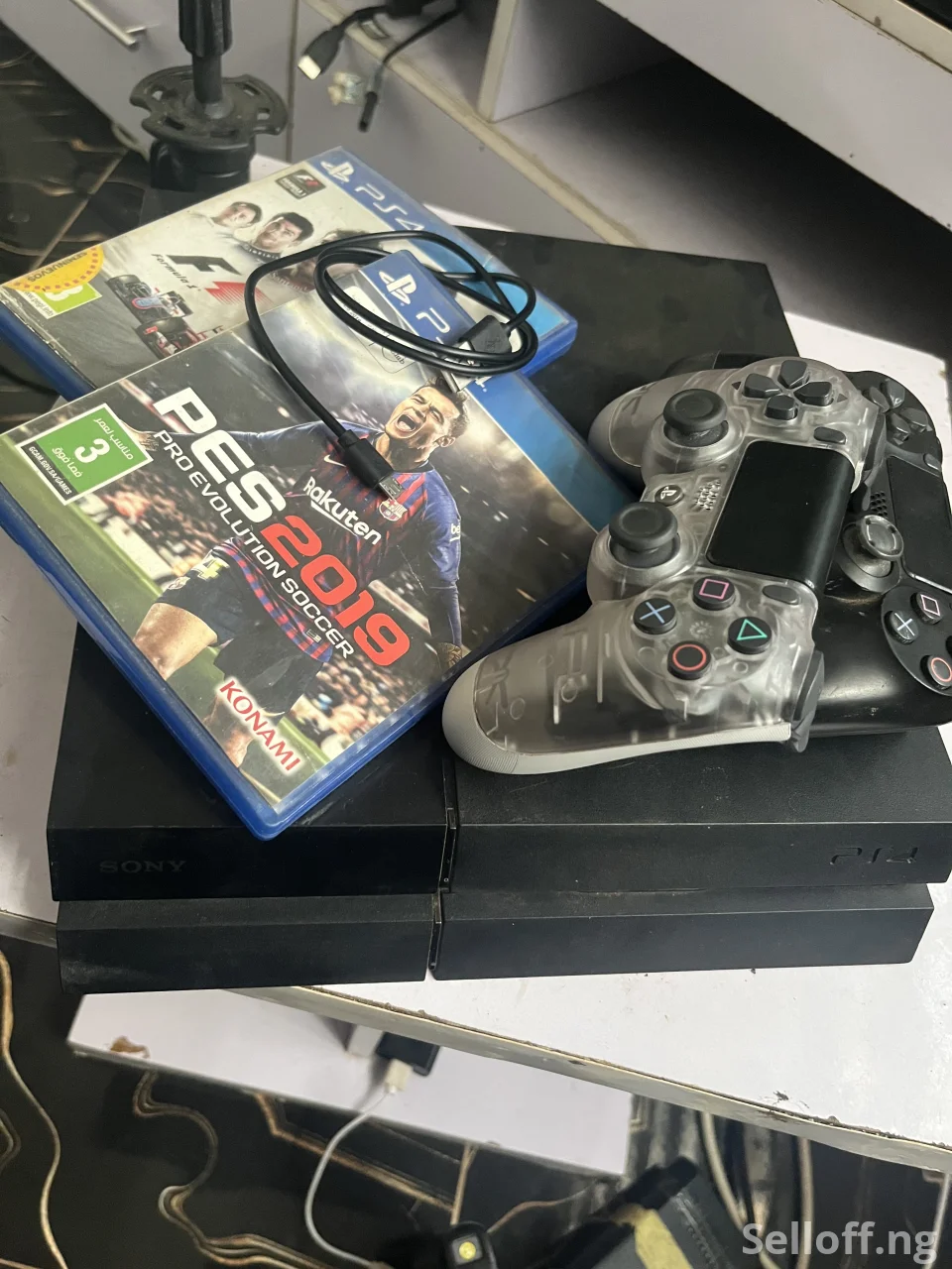PlayStation 4 Fat 500GB (PS4)  with 2 Controllers + 2 Free Games