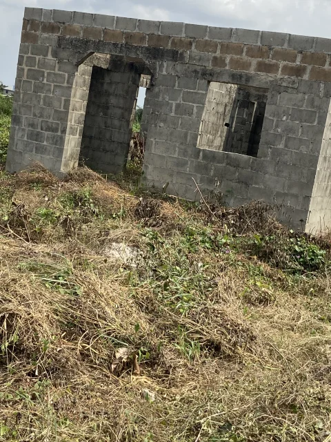 Roofing Level 3-Bedroom Apartment Includes 2shops on Half Plot of Land