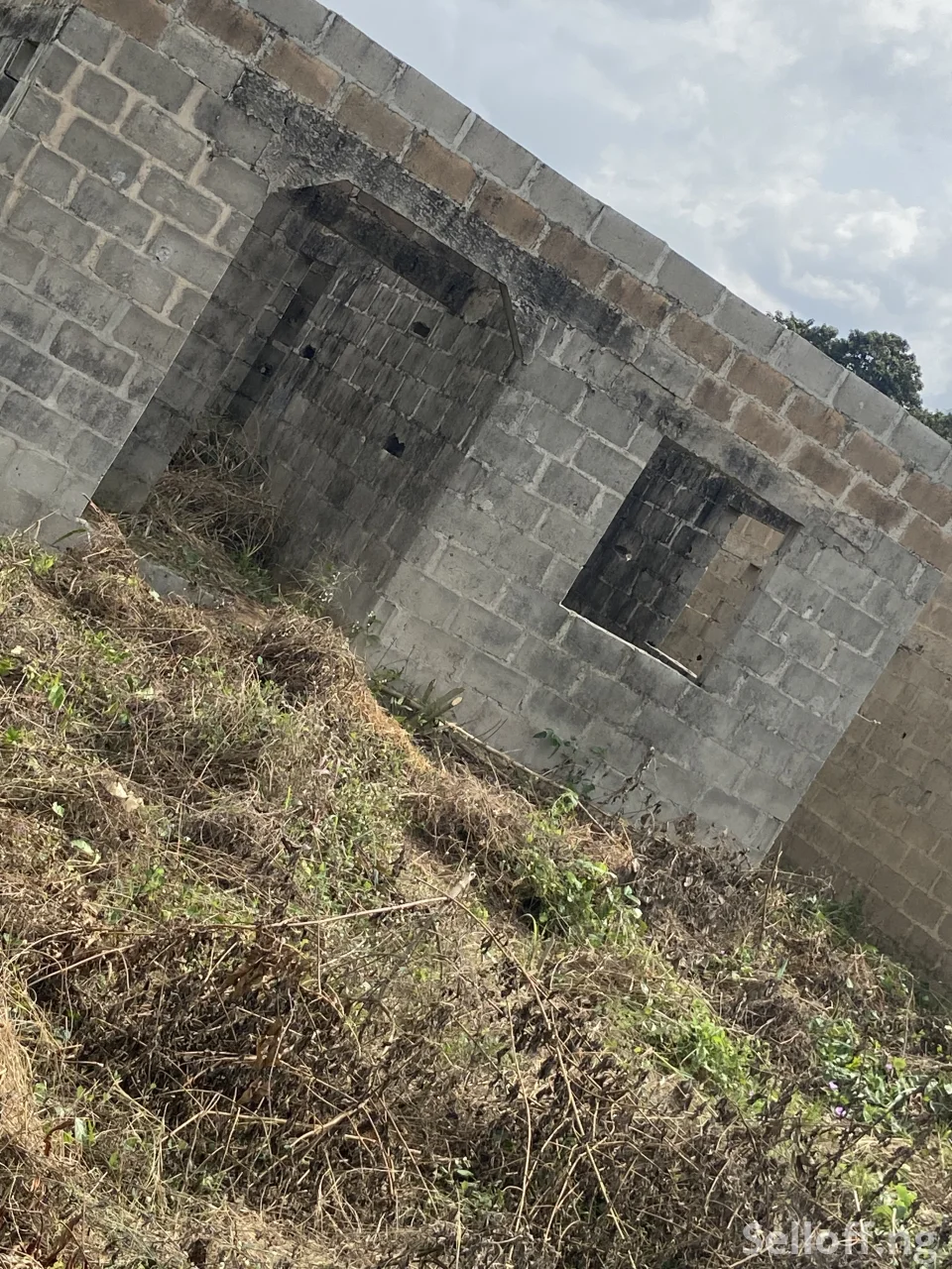 Roofing Level 3-Bedroom Apartment Includes 2shops on Half Plot of Land