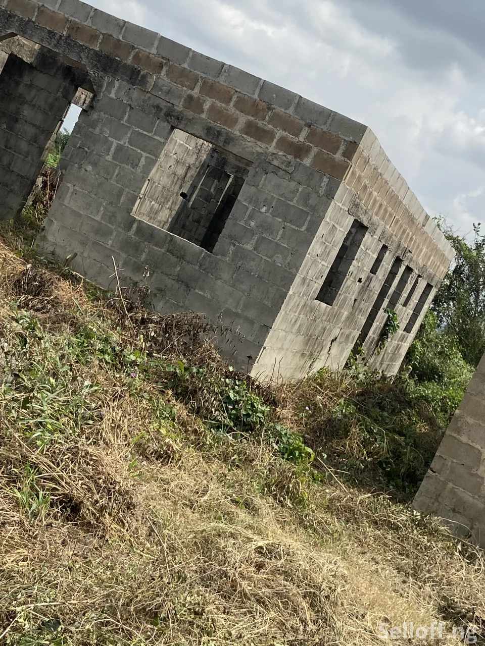 Roofing Level 3-Bedroom Apartment Includes 2shops on Half Plot of Land