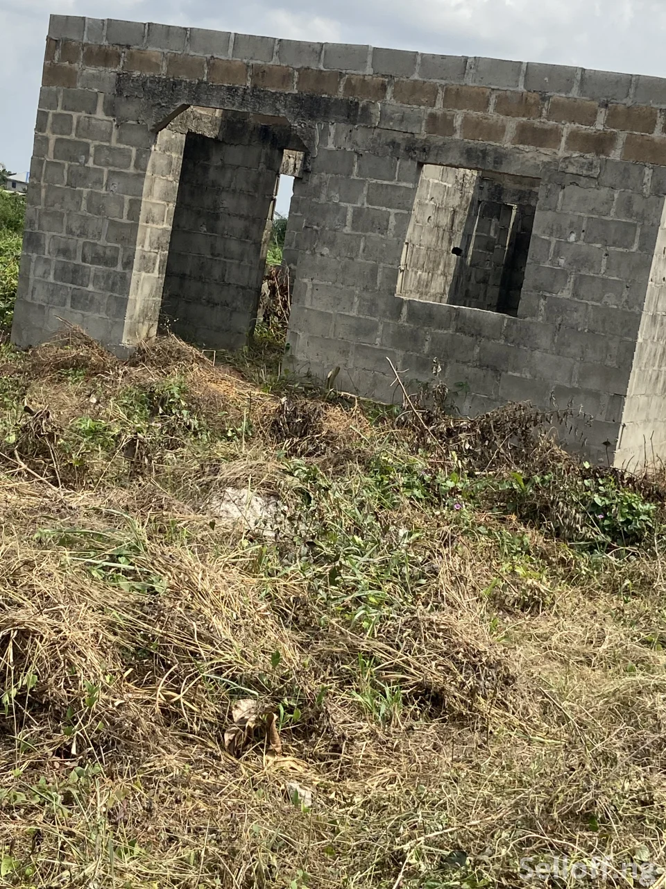 Roofing Level 3-Bedroom Apartment Includes 2shops on Half Plot of Land